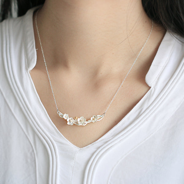 model wearing Sterling Silver Sakura Flower Necklace