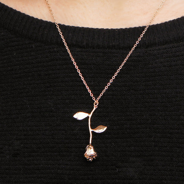 Model wearing the rose necklace