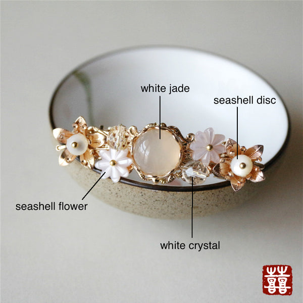 details of the barrette: made of white jade, seashell, white crystal, seashell and quality alloy