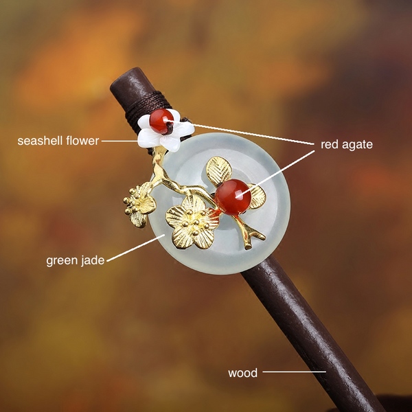 This hair accessories is made of wood, red agate, green jade and seashell.