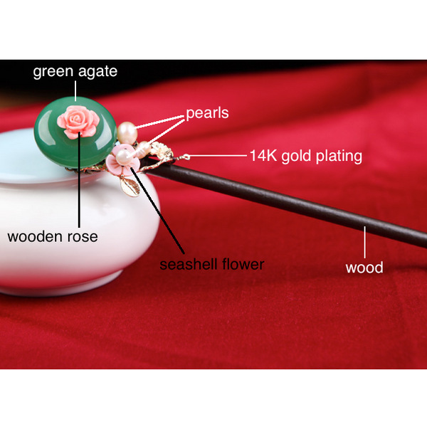 this hair pin is made of wood, green agate, seashell, freshwater pearls and 14K gold plating