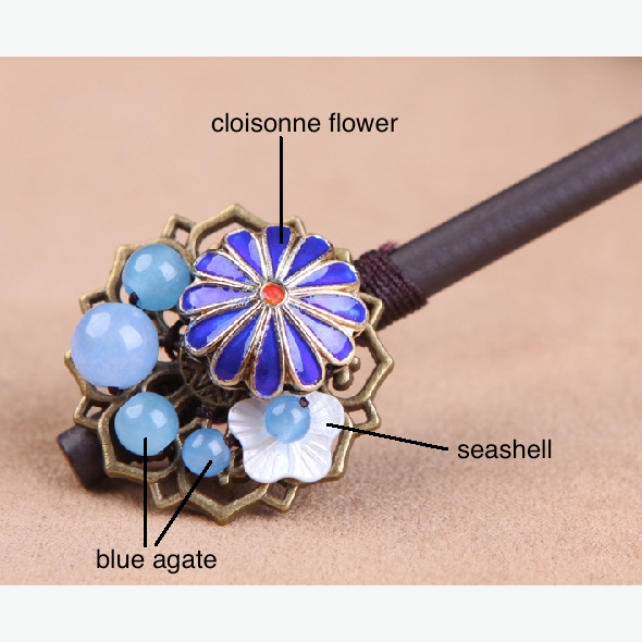 details of the hair stick: it is made of blue agate stone, seashell, enamel cloisonne and wood
