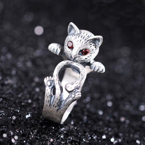 Front view. It looks like it is meowing to you!