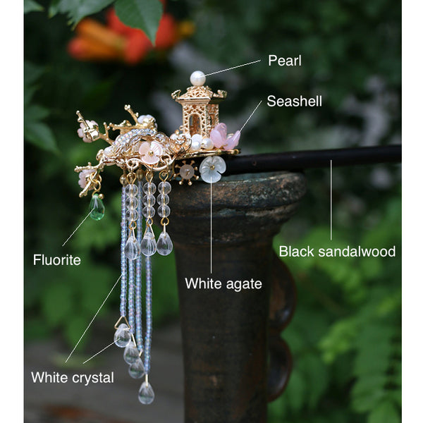 this hairpin is made of precious black sandalwood, white agate, crystal, glass beads, seashell and various gem stones.