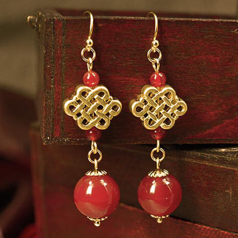 Drop earrings with Chinese knot. These endless knots are lucky symbols in Asian cultures