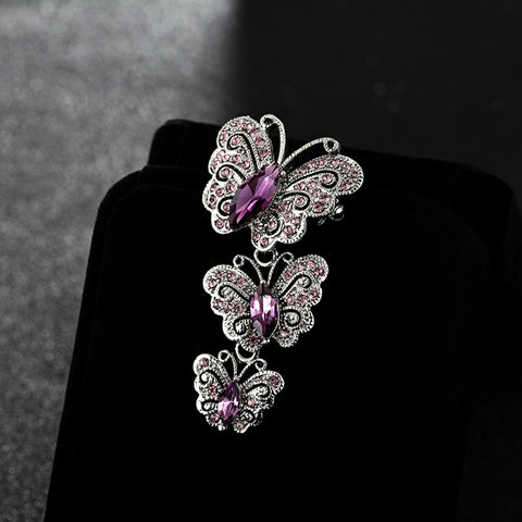 Brooch for women with three butterflies, with purple rhinestone