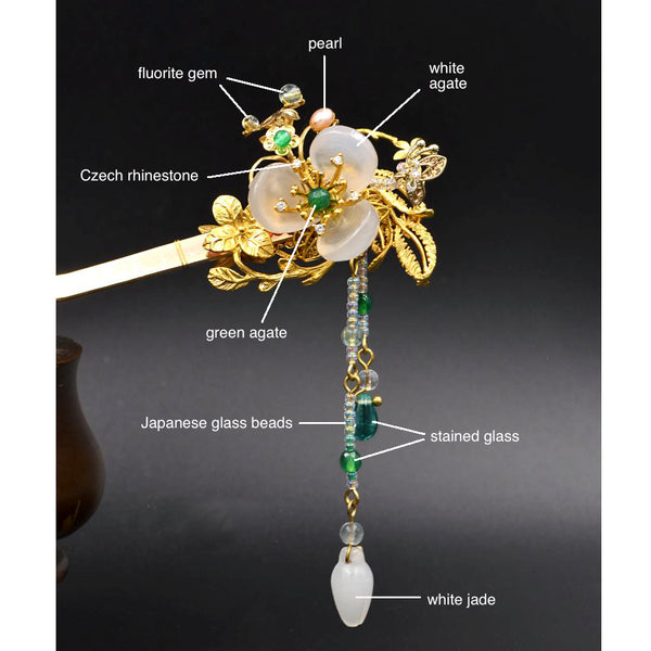 this hair stick is made of white agate, green agate, stained glass beads, freshwater pearls and 24K gold plating