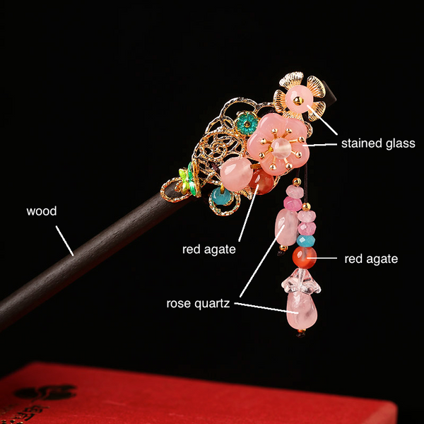 details of the hairpin: it is made  of wood, agate, rose quartz and stained glass
