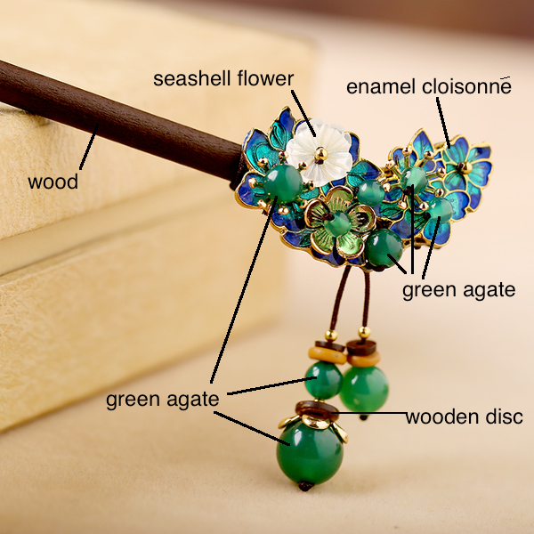 this hair pin is made of wood, green agate beads, seashell and enamel cloisonne