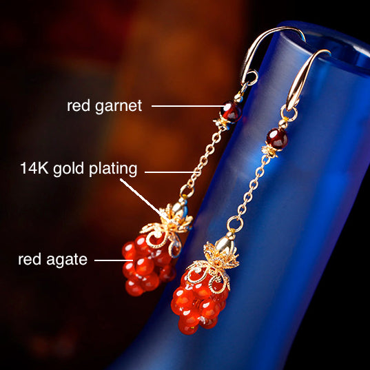 The earrings is made of red garnet, red agate and copper alloy plated with 14K gold