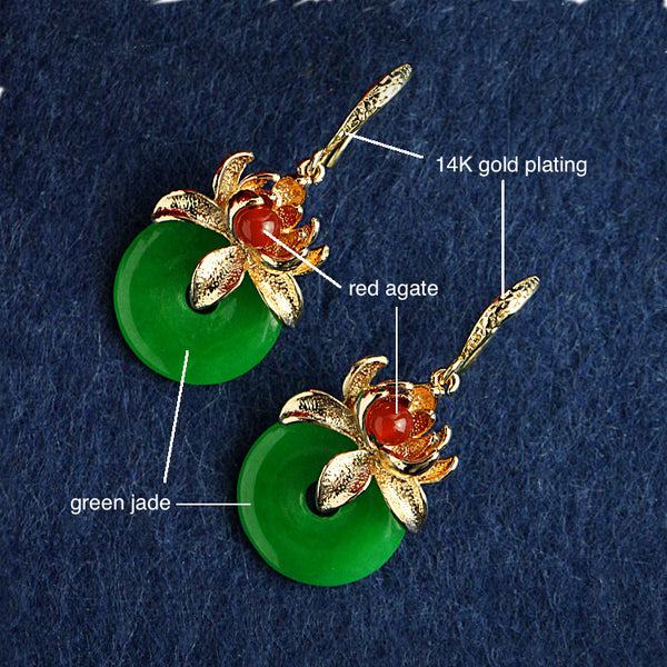 details of the earrings: it is made of green jade, red agate, and 14K gold plated metal parts