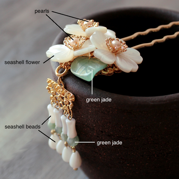 details of the hairpin. It is made of green jade, seashell and freshwater pearls.