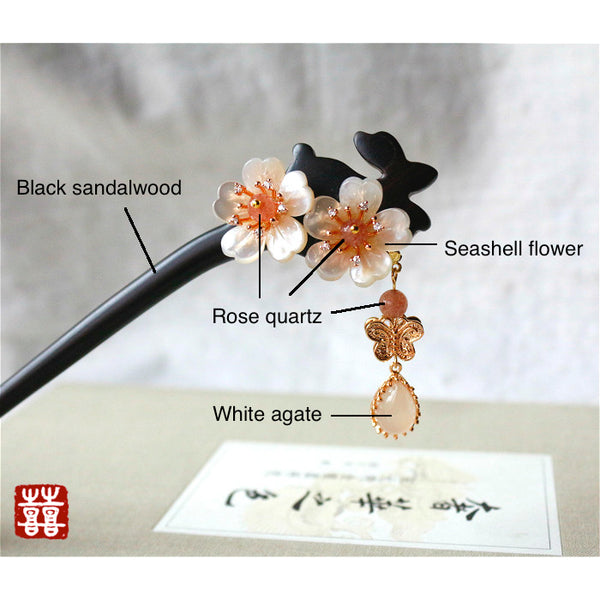 This hair accessories is made of black sandalwood, rose quartz, agate and seashell