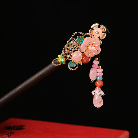 Pink flower hair sticks in Asian style design