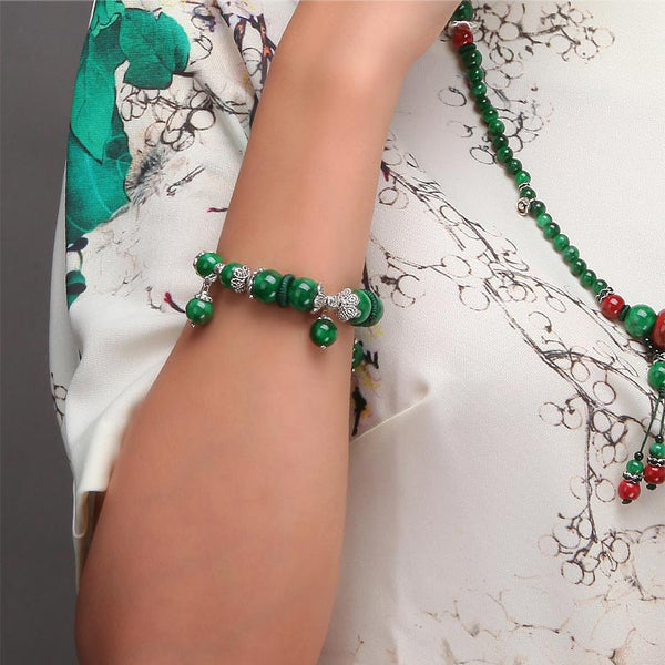 model demonstration, with the jade charm bracelet on wrist
