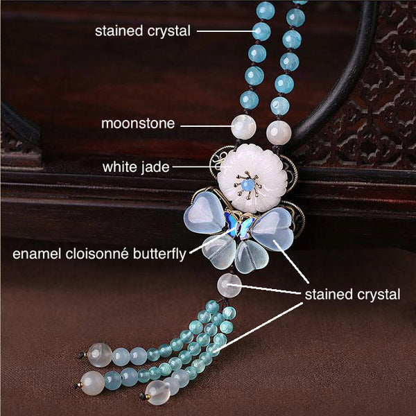 details of the necklace: it is made of enamel cloisonne, jade, moonstone