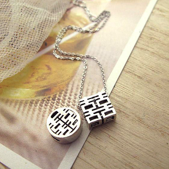 two styles of double happiness pendants together: square and round 