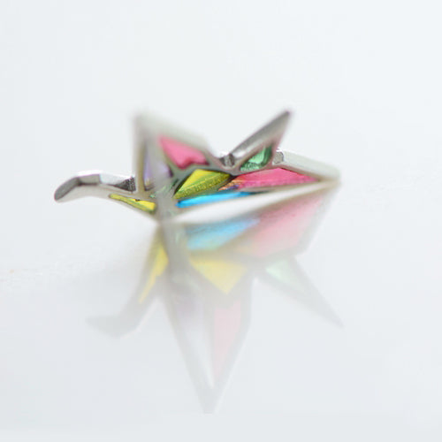 the transparent stained glass of the earring