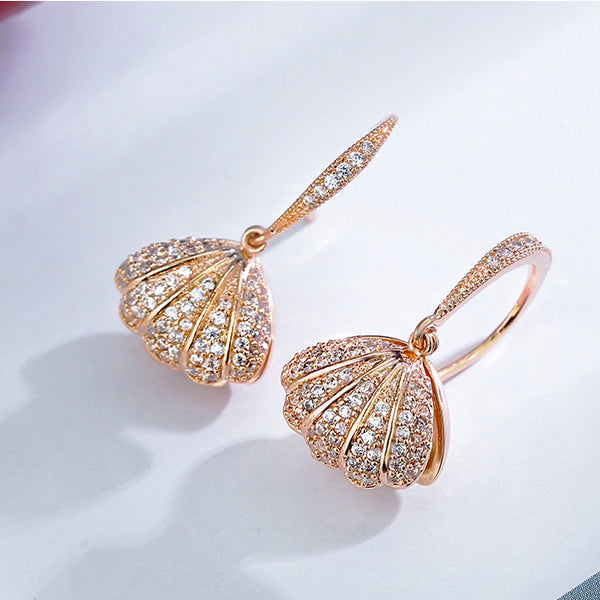 women's fashion earrings in shape of lovely seashell